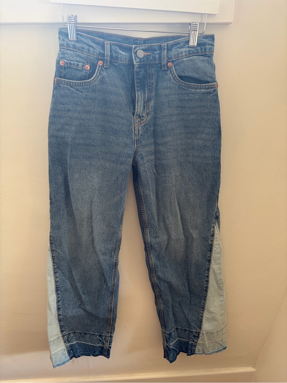 Levi's high rise baggy blue jeans with light blue panels on the lower legs